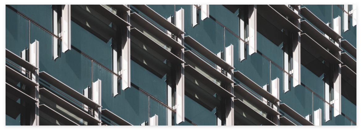 Exterior of building with modern glass construction.