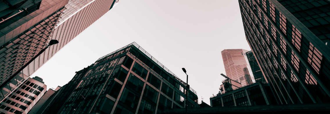 City skyline seen from street below.