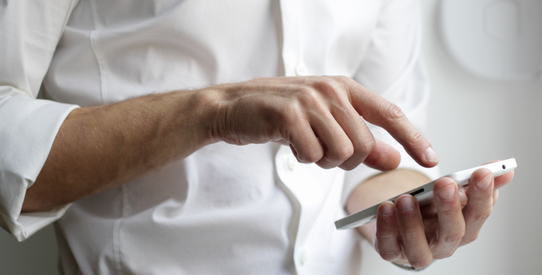 Person using smart phone.